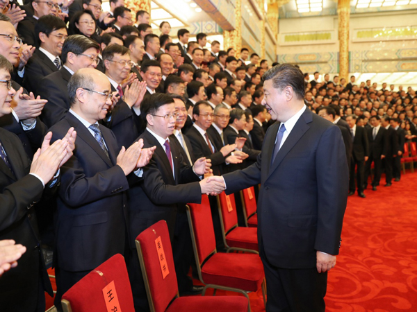 2月20日，党和国家领导人习近平、李克强、栗战书、汪洋、王沪宁、赵乐际、韩正等在北京人民大会堂会见探月工程嫦娥四号任务参研参试人员代表。（新华社记者 鞠鹏 摄）